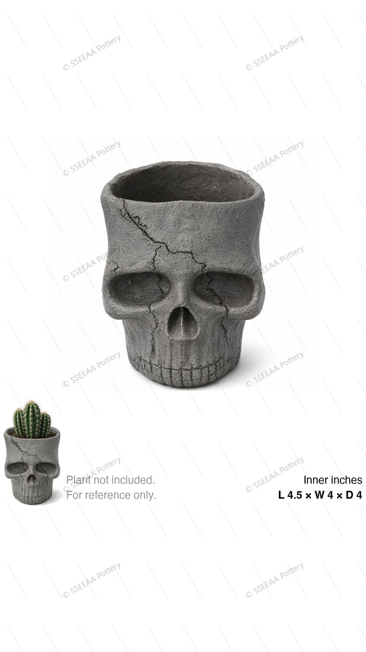 Gray skull-shaped ceramic pot with cracked weathered texture and open top.