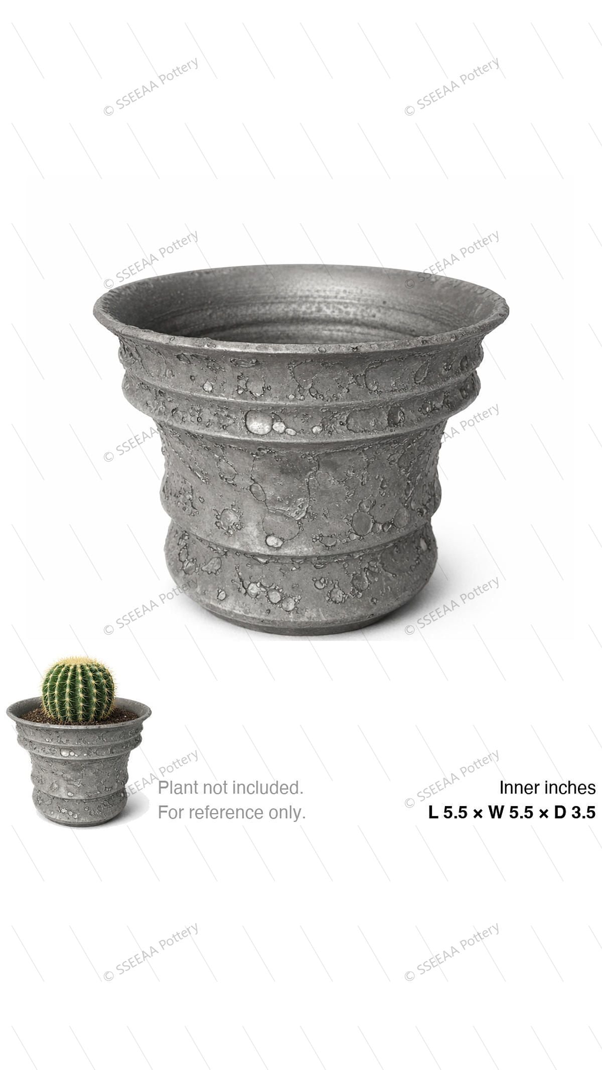 Textured grey footed pot with pitted finish and wide rim shown on white background.