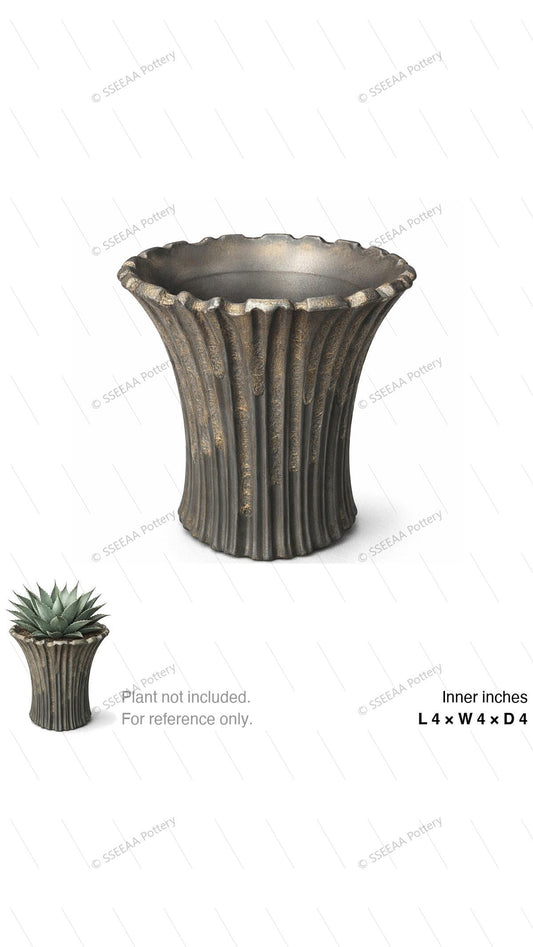 Bronze fluted pot with scalloped rim and tapered profile