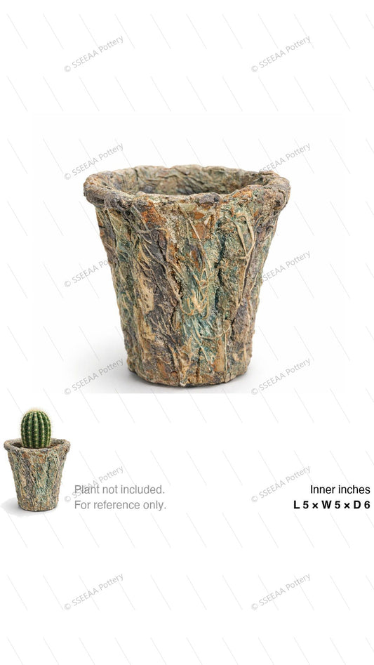Weathered moss-green textured pot with a tapered form and broad rim
