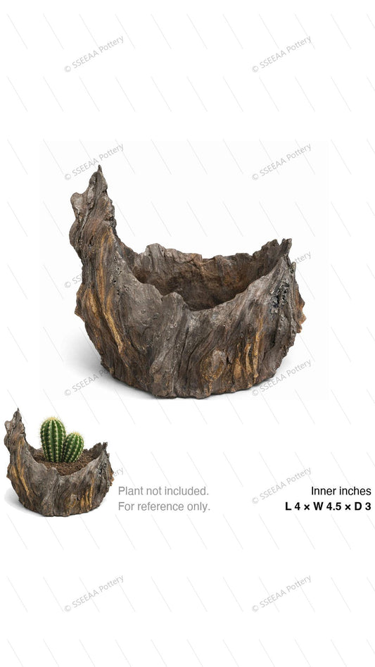 Weathered bark-inspired sculptural pot with irregular rim and dark brown-gray finish