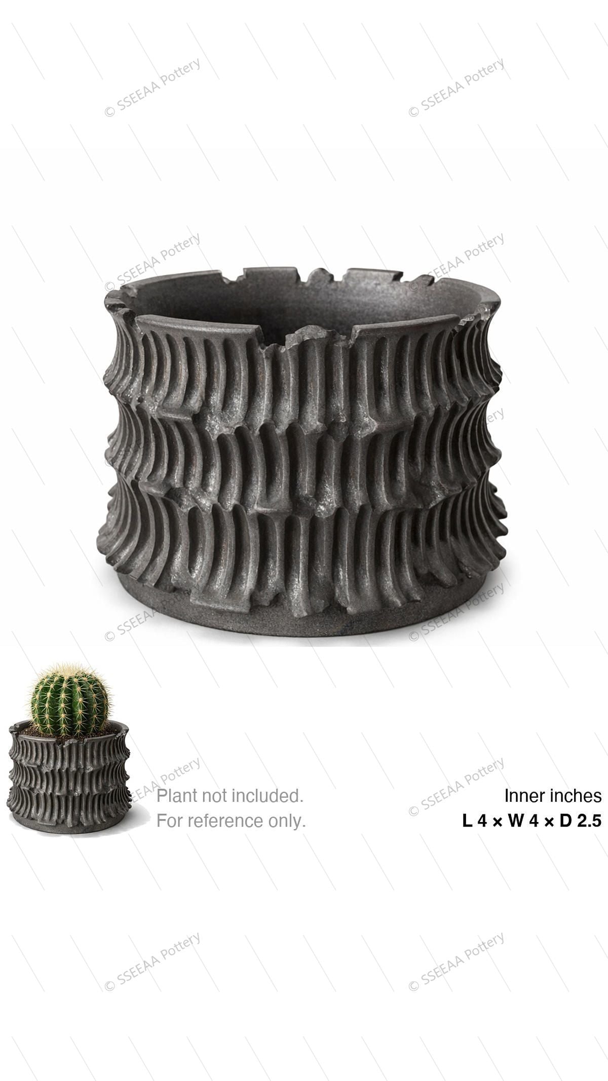 Dark ribbed sculptural pot with weathered charcoal finish and flared rim.